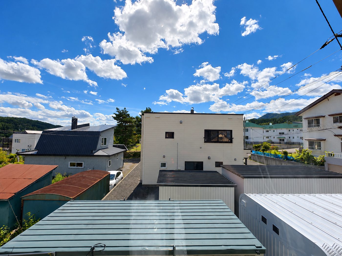 Green hills and blue sky over Furano on a summer day