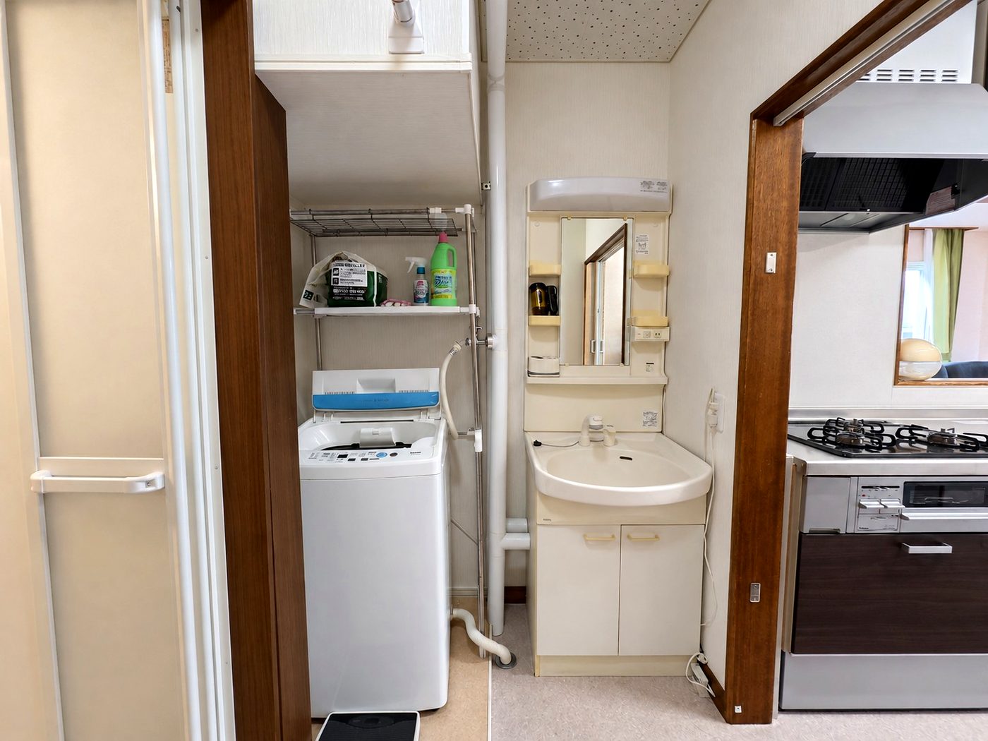 Washroom with washing machine and washbasin